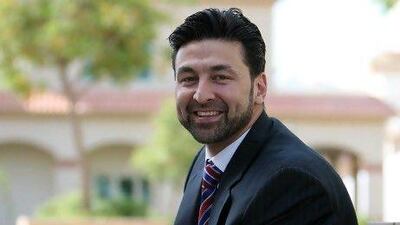 Shane Phillips combines charity work with his day job as a consultant for the recruitment firm Stanton Chase International. Pawan Singh / The National