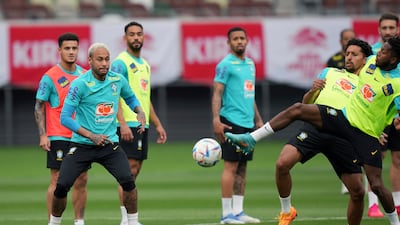 Brazil's Neymar, second left,trains for the friendly against Japan. AP