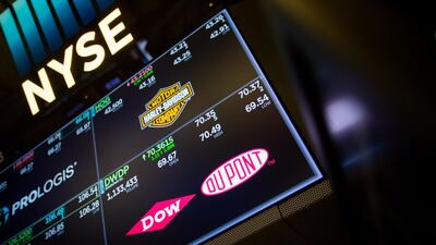 A monitor displays DowDuPont signage on the floor of the New York Stock Exchange (NYSE) in New York. U.S. stocks have added to all-time highs this week. Photo: Bloomberg