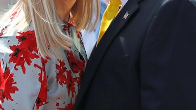 U.S. President Donald Trump kisses U.S. White House senior advisor Ivanka Trump as they arrive at Sardar Vallabhbhai Patel International Airport in Ahmedabad. REUTERS