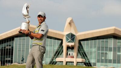 Pablo Larrazabal poses in front of the Abu Dhabi Golf Club clubhouse with the falcon trophy on Sunday. Scott Halleran / Getty Images