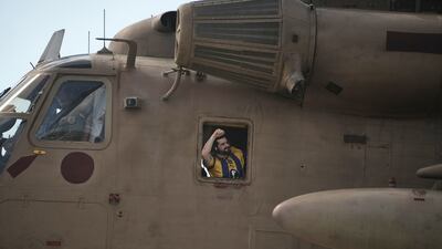 Ziv Berman, an Israeli hostage released from the Gaza, at the window of a helicopter landing at Sheba Medical Centre in Ramat Gan, near Tel Aviv. AP