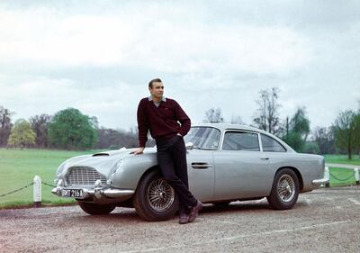 Sean Connery with one of the two Aston Martin DB5 cars used in the filming of 'Goldfinger'. Rex