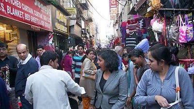 Journalist Suryatapa Bhattacharya reacts when a man on a scooter rudely commands her to get out of the way while on a pedestrian walkway in New Delhi.