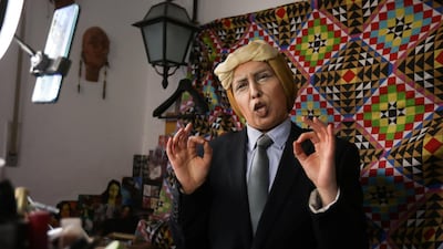 Alaa Bliha records a video as she imitates US President Donald Trump. Reuters