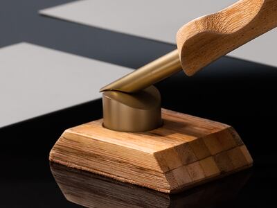 The pen’s brass cap mimics the shape of the qalam, an ancient reed pen used in Arabic calligraphy