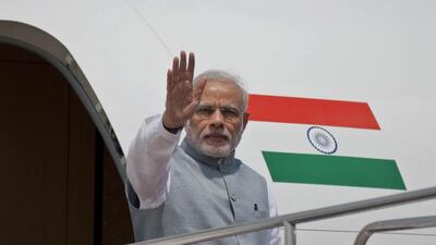 Indian prime minister Narendra Modi waves to the gathering upon arrival at the Hazrat Shahjalal International airport in Dhaka, Bangladesh. His comments to the country's prime minister brought sarcastic replies from social media. (AP Photo/A.M. Ahad)