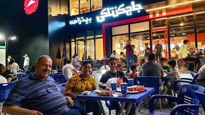 Lab scientist Zaid Al Badri, 68, says the presence of foreign companies is a symbol of Iraq's recovery, security and stability