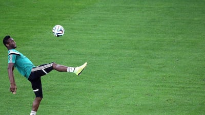 Nigeria midfielder John Obi Mikel trains at the Arena da Baixada in Curitiba, Brazil, ahead of his side's 2014 World Cup Group F opener against Iran on Monday. Behrouz Mehri / AFP / June 15, 2014