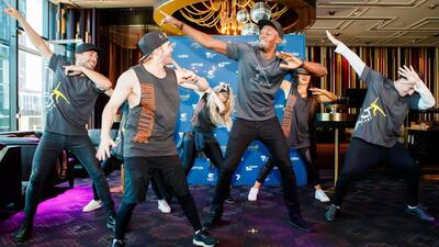 Usain Bolt strikes his trademark 'Lightning Bolt' pose during the press conference for the Nitro Athletics event in Melbourne. Mark Peterson / AFP