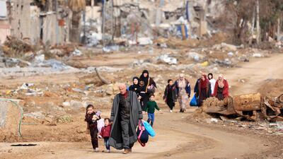 Palestinians flee from the southern outskirts of Gaza City last November. AFP