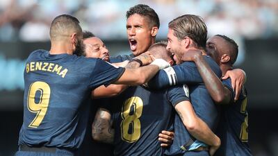 Real Madrid's Toni Kroos, centre front, celebrates with teammates after scoring his side's second goal. AP Photo