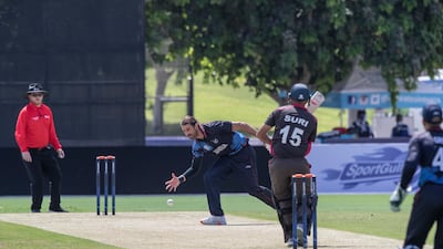 David Wiese bowls for Namibia during the T20 International against UAE at the ICC Academy in Dubai on October 5, 2021. Photos by Antonie Robertson / The National