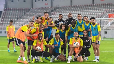 The UAE football team conclude training at the Abdullah bin Khalifa Stadium in Doha ahead of their 2022 World Cup play-off against Australia on Tuesday. Photo: UAE FA