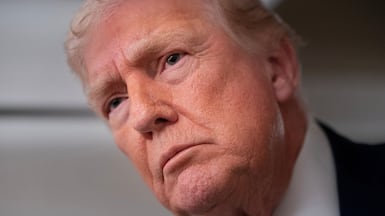 US President Donald Trump on Air Force One on Sunday. Reuters