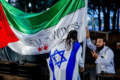 Pro-Israel and pro-Palestine protesters confront each other during a demonstration in Atlanta, Georgia on Tuesday. Thousands of Israelis and Palestinians have died since the militant group Hamas launched an attack on Israel from the Gaza Strip on October 7. EPA