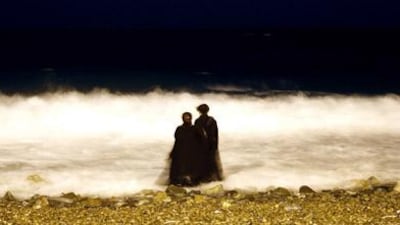 Two Saudi women wade into the waters of the Red Sea near Jeddah.