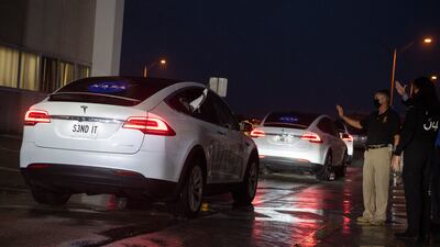 The Crew-3 astronauts head to the launch pad in a convoy of Tesla cars. EPA / Joel Kowsky / NASA / HANDOUT