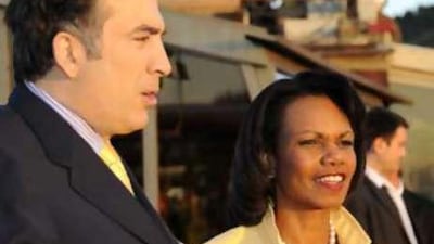 The Georgian President Mikhail Saakashvili speaks with the US Secretary of State Condoleezza Rice during their meeting in Tbilisi.