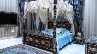 One bedroom is entirely filled with furniture inlaid with mother-of-pearl.