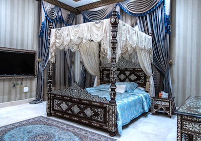 A bed encrusted with mother-of-pearl. Victor Besa / The National