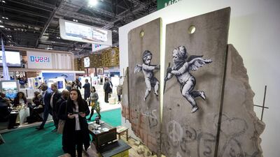 The 'replica separation barrier' created by British street artist Banksy stands. Reuters