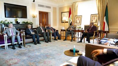 Mr Al Kadhimi speaks with Sheikh Ahmad.