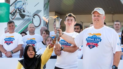 The Special Olympics Torch being held by officials. Leslie Pableo for The National