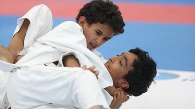 Mohammed Alhajri and Abdul Haldara compete in the Al Ain Jiu-Jitsu Junior Open. Delores Johnson / The National / September 20, 2015