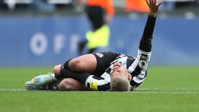 Newcastle midfielder Bruno Guimaraes after injuring his ankle in the first-half that would see him substituted at the break. Reuters