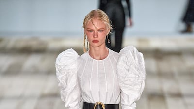 Alexander McQueen uses voluminous sleeves and tiny pin tucks to create drama. Spring summer 2020