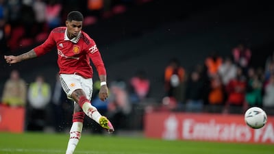 Manchester United's Marcus Rashford scores in the penalty shootout. AP