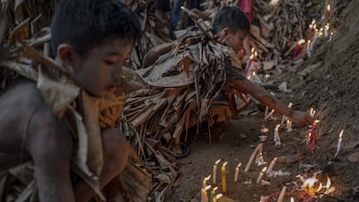 Devotees covered in mud and dried banana leaves take part in the Taong Putik ("mud people") Festival in the village of Bibiclat in Aliaga town, Nueva Ecija province, Philippines. Each year, the residents of Bibiclat village in Aliaga town celebrate the Feast of Saint John by covering themselves in mud, dried banana leaves, vines, and twigs as part of a little-known Catholic festival. Getty Images