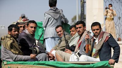 Houthi fighters ride in the back of a lorry after a funeral in Sanaa for fellow rebels killed in their offensive on the government-held Marib province in northern Yemen. Reuters