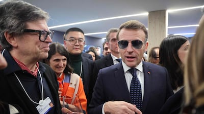 French computer scientist Yann Le Cun and French President Emmanuel Macron at the Business France event in Davos. AFP