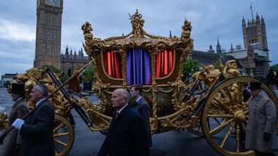 It passes the Palace of Westminster during the early morning rehearsal. Getty Images