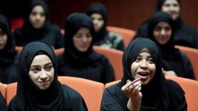 Students Salma al Jaberi (R), 21, and Yusra Bani Hashem (L), 19, ask questions during the Akoun Workshop - an initiative that aims to inspire local youths to become entrepreneurs. Silvia Razgova / The National