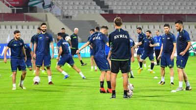 Syria's national team attends a training session at Sharjah Stadium. AFP