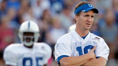 Peyton Manning, right, has only been able to watch practices and pre-season games as he recovers from a second neck surgery in 15 months.