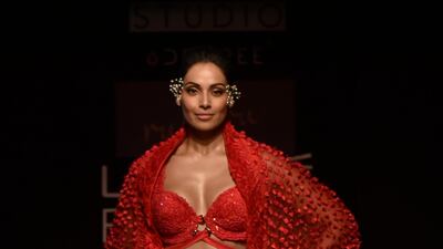 Actress Bipasha Basu channels Tagore's warrior princess Chitrangada in an outfit by designer Ruceru. AFP