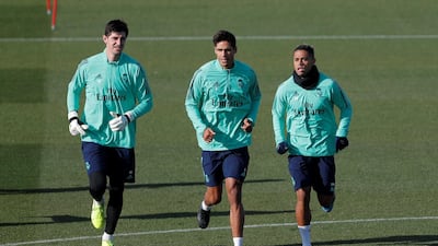 Real Madrid's Thibaut Courtois, Raphael Varane and Mariano Diaz during training. Reuters