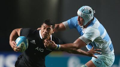 Charles Piutau of the All Blacks is tackled by Argentina's Patricio Albacete. David Rogers / Getty Images