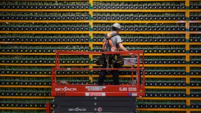 A technician inspects the back of a bitcoin mining facility in Quebec. AFP
