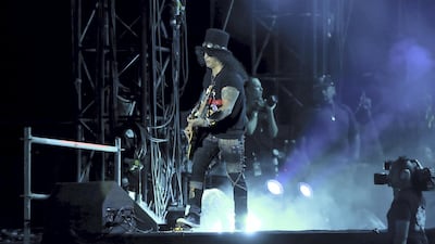 Slash, lead guitarist of Guns N’ Roses, rocks out at the Du Arena. Photos by Victor Besa / The National