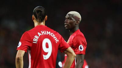 Paul Pogba of Manchester United talks to Zlatan Ibrahimovic during the Premier League match between Manchester United and Southampton at Old Trafford on August 19, 2016 in Manchester, England. Michael Steele / Getty Images