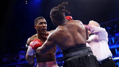 Anthony Joshua punches Jermaine Franklin after the final bell as the referee attempts to break them up during the Heavyweight fight between Anthony Joshua and Jermaine Franklin at The O2 Arena. Getty Images