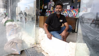 Noushad Ahmed, who has owned Jamal Al Tamimi Designing for two years, put waterproof foam on the glass display for protection