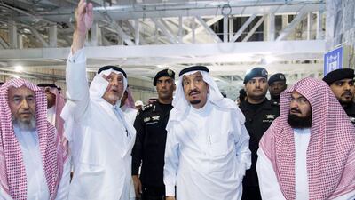 Saudi Arabia’s King Salman and Mecca governor Khaled Al Faisal visit the site of the crane carsh at Grand Mosque on Saturday. AFP