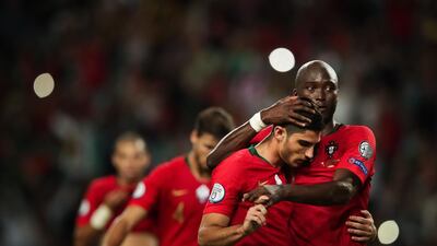 Portugal''s Gonçalo Guedes (L) celebrates with Danilo Pereira after scoring during the UEFA Euro 2020 qualifying round Group B soccer match between Portugal and Luxembourg at Alvalade stadium in Lisbon, Portugal. EPA
