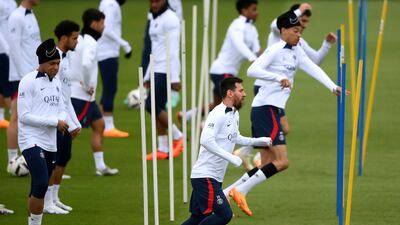 Kylian Mbappe and Lionel Messi attend a training session for PSG. AFP